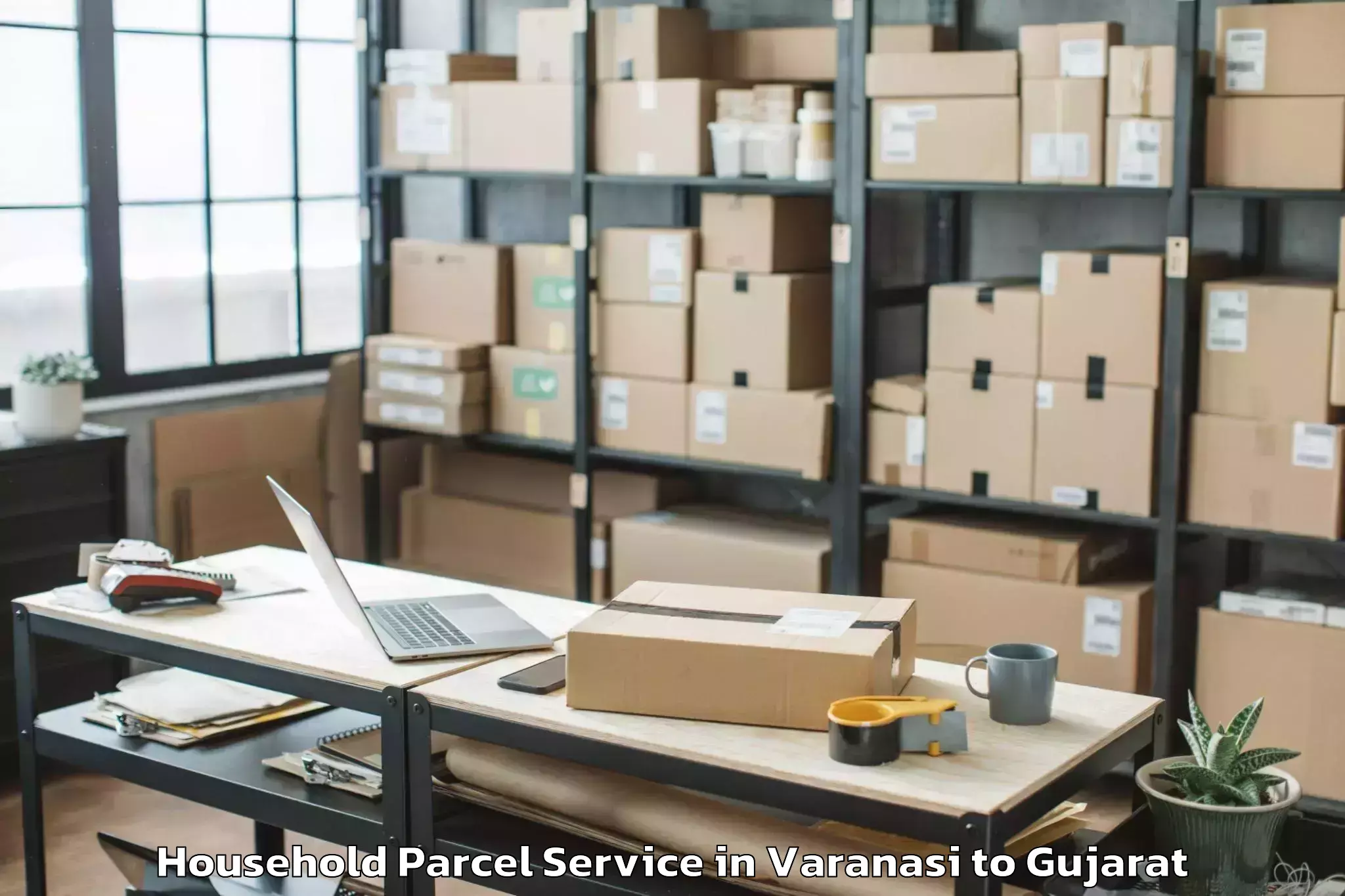 Top Varanasi to Madhav Kampo Household Parcel Available